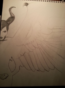After working on the outline and facial features with pencil, I need to figure out what to do with the wings.